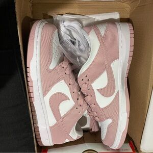 Brand new Nike Dunk low with Pink Corduroy size 6.